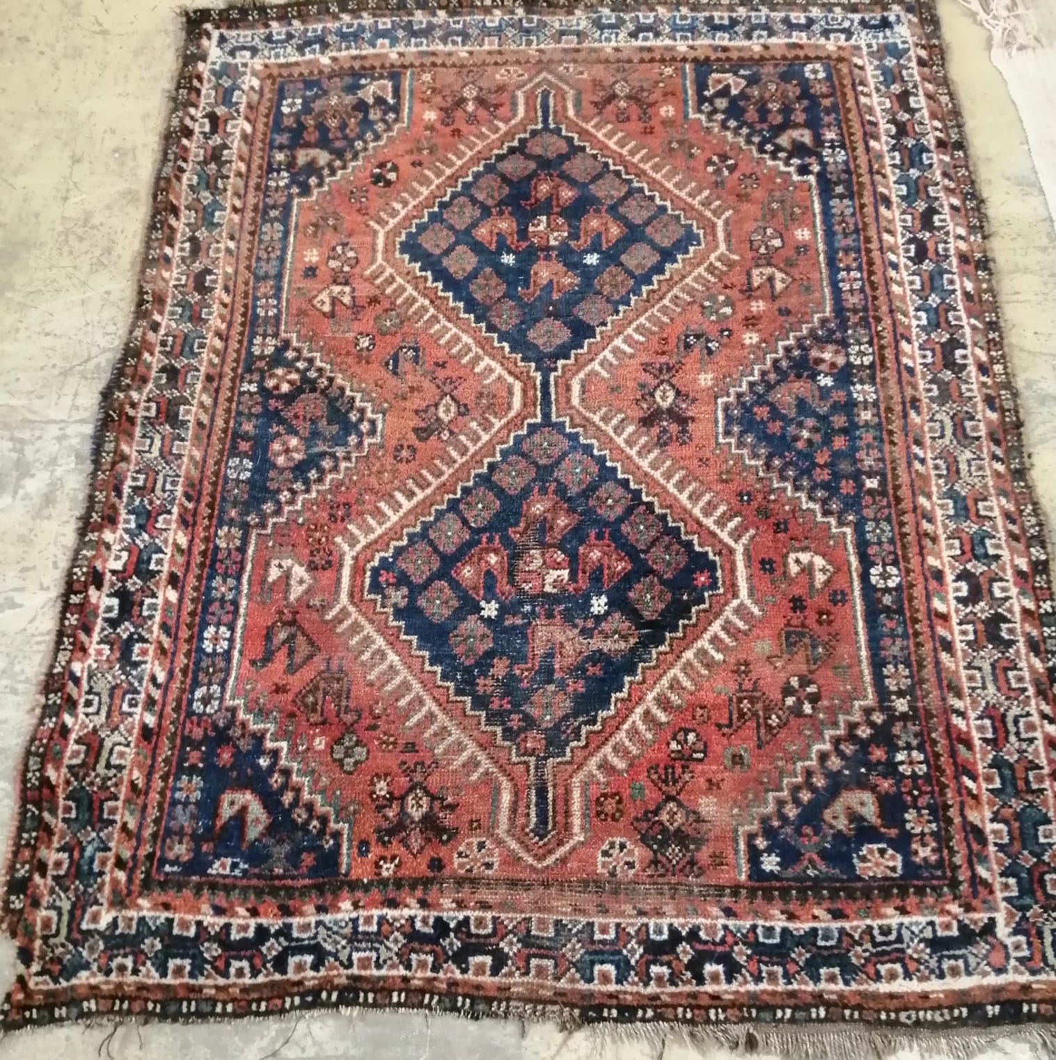 A Caucasian blue ground rug, 154 x 116cm